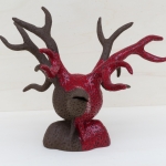 Bruin Rode Kop met horens