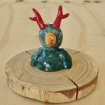 Mini gekleurde hoorn met gele snavel