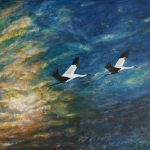 Kraanvogels bij zonsondergang