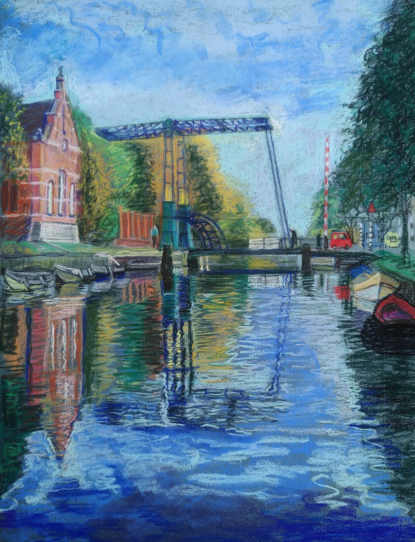 The iron cast bridge over the Haarlemmervaart in Amsterdam