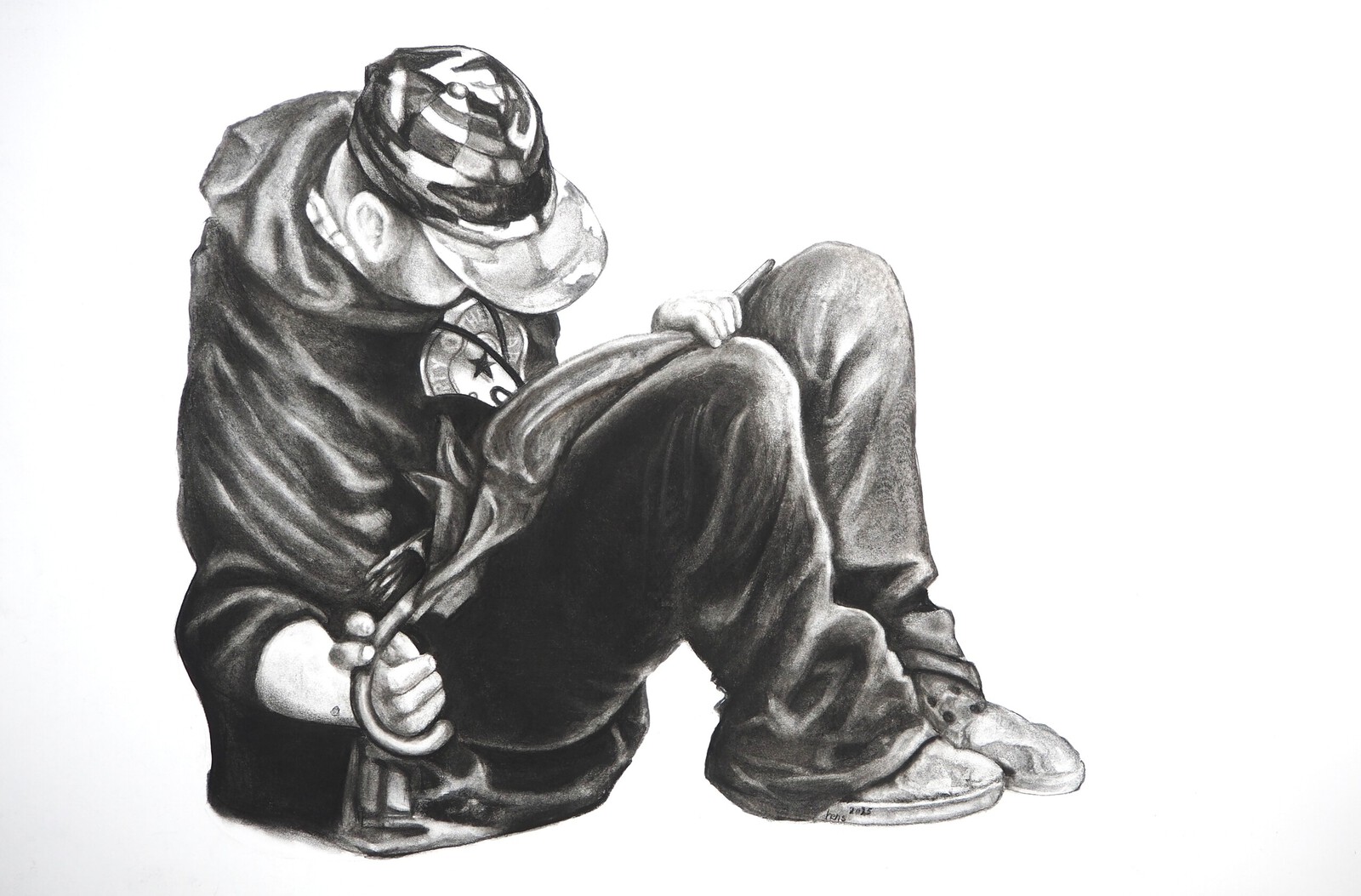 Bedelaar op Karelsbrug in Praag.