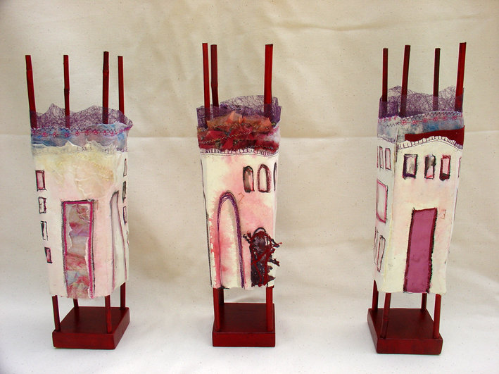 VERKOCHT - Drie rode huisjes