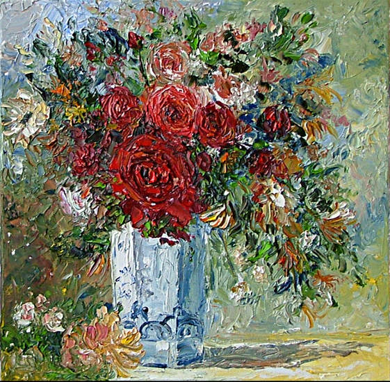 boeket rozen in wit blauwe vaas