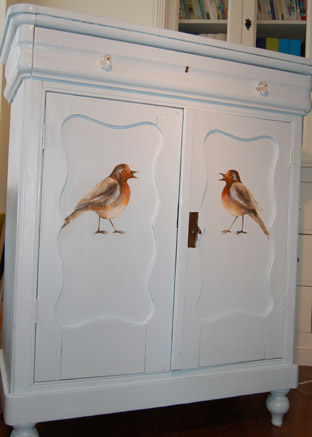 Kastje met roodborstjes