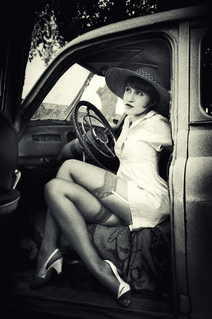WOMAN IN A CAR