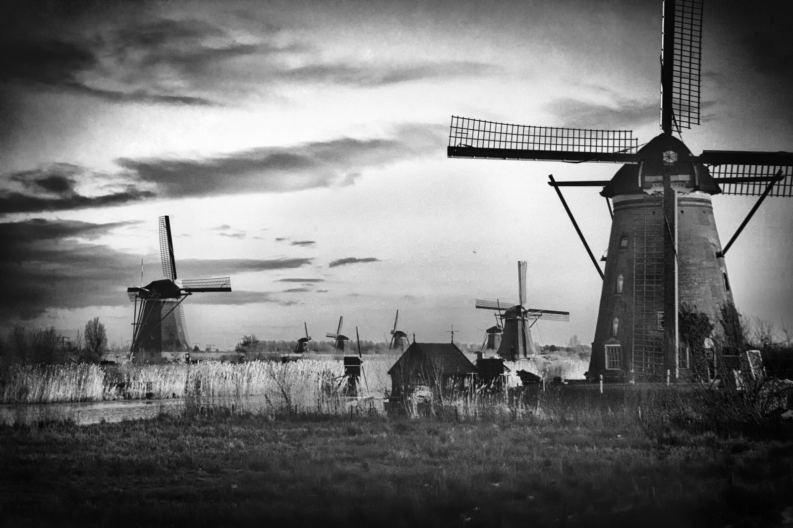 Kinderdijk. Winter Evening in BW.