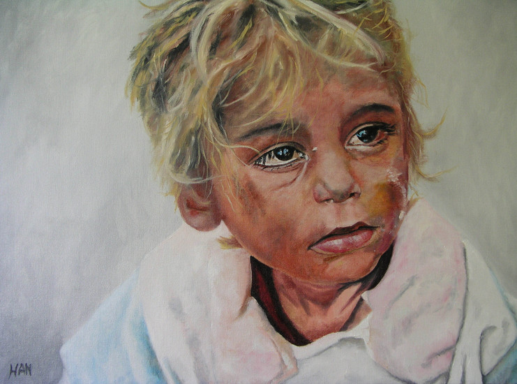 Pakistaanse jongen tijdens watersnood