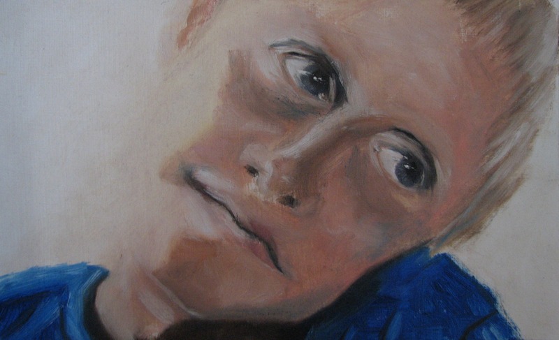 Jongen in blauwe trui