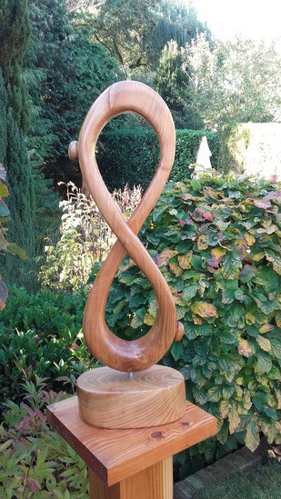 Two Figures Lemniscate of Cherry Wood