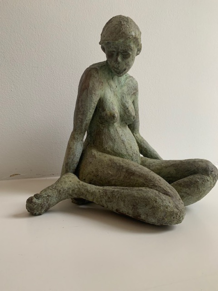 Inzichzelf gekeerd zittend model