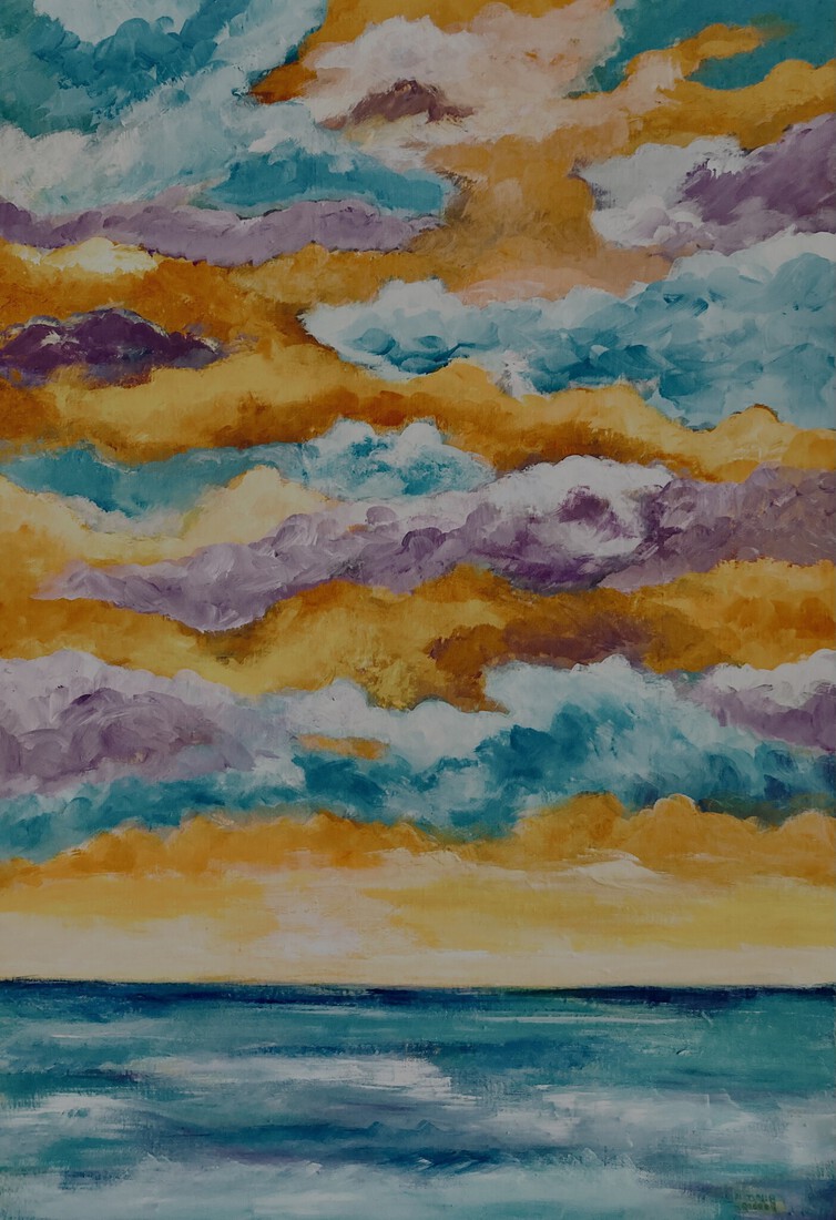 Kleurrijke wolken boven zee