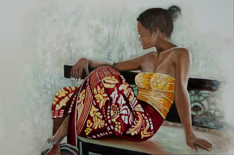 Balinese dame op bankje