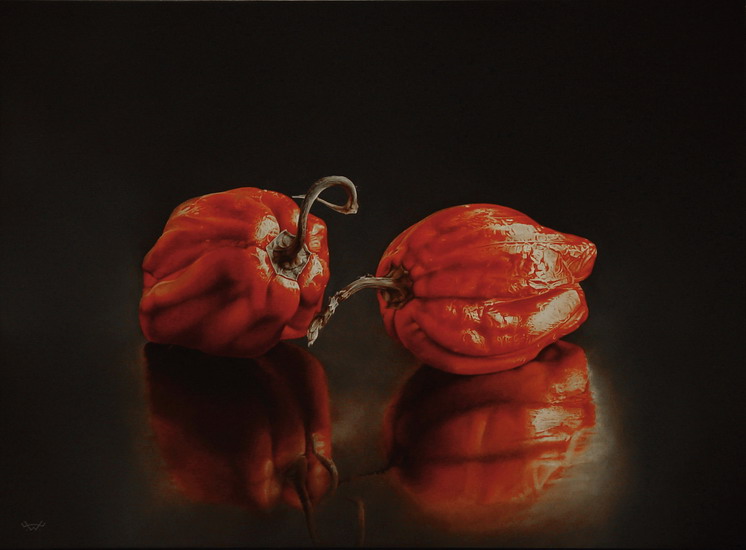 Stilleven met twee rode pepers.