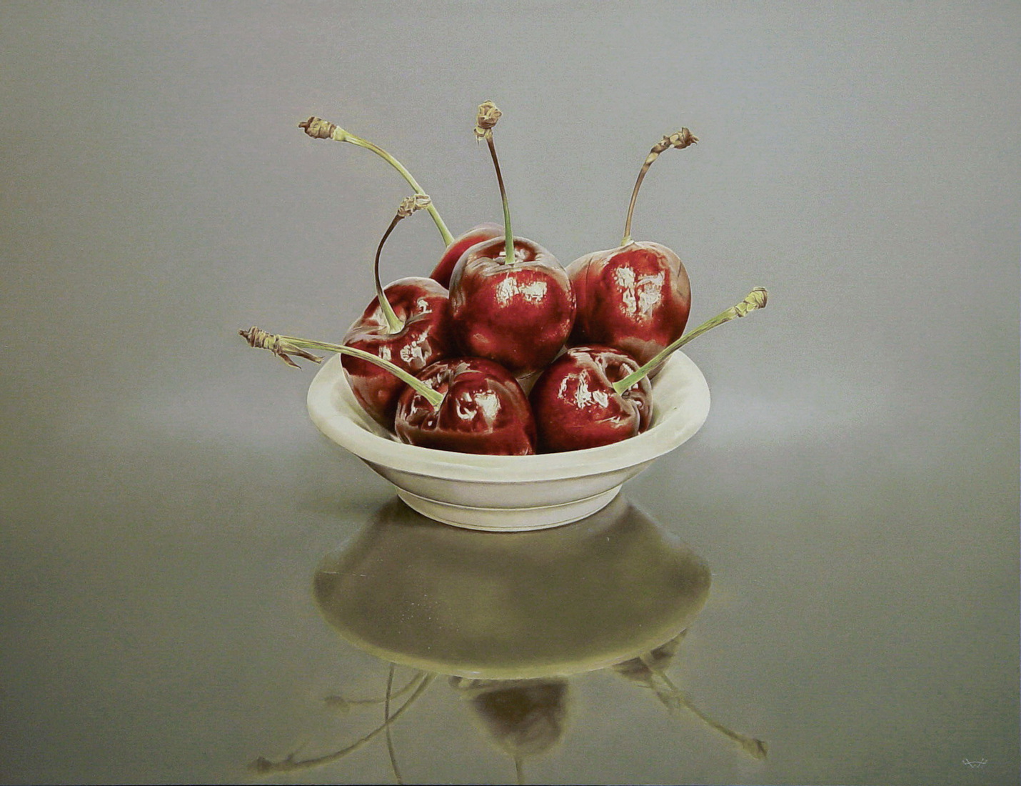 Stilleven met kersen in een schaaltje.