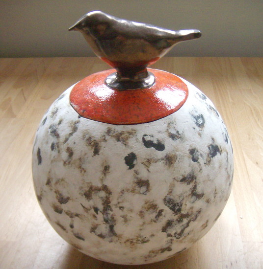 ronde doos met vogel