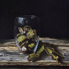 Wilde kastanjes achter glas