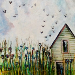 Huis achter struikgewas