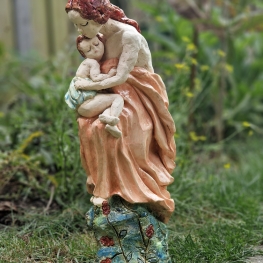 Moeder met kind op schoot