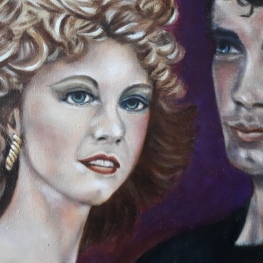 Grease, John Travolta (Danny) en Olivia Newton John (Sandy).