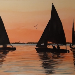 Zeilen bij zonsondergang 