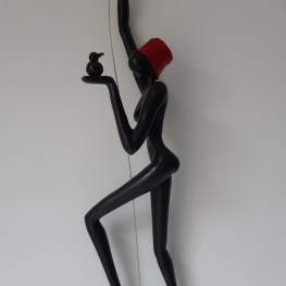 Geveltoeriste met vogeltje en rood hoedje