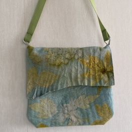 Lichtblauw geitenleren tasje