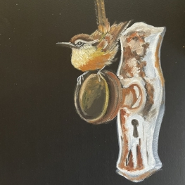 Winterkoninkje op deurknop