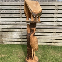Voeder Vogelhuis met uil en reiger in de stam