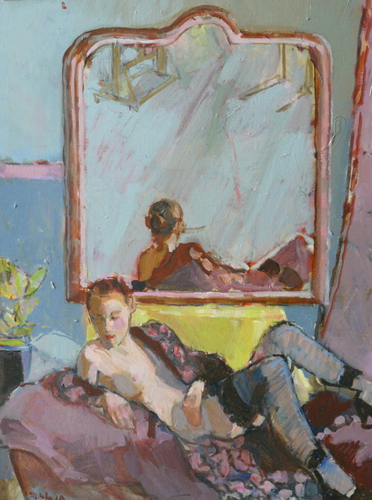 vrouw liggend voor spiegel