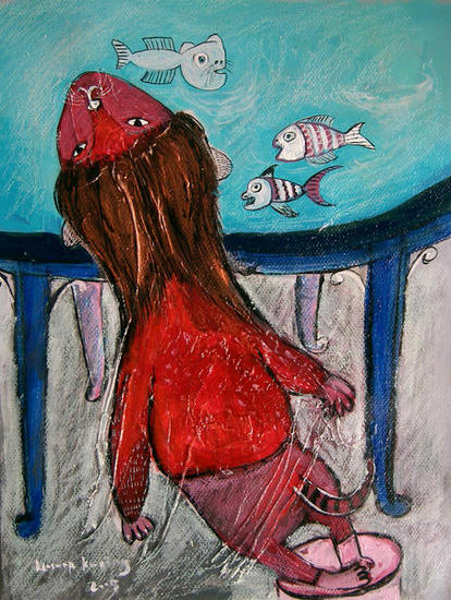 Watching fish at aquarium