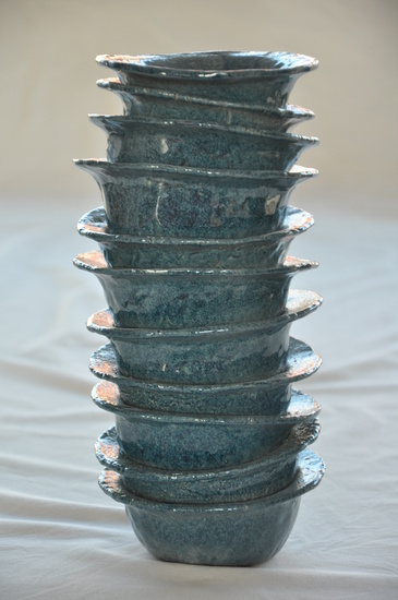 Vaas van gestapelde bakjes