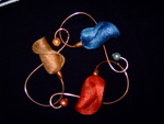 Mulfunctioneel sieraad als ketting of broche uit de serie Chapeau Tulipa.