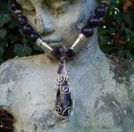 Sieraden handgemaakt met zilver-, koper- en verguld draad