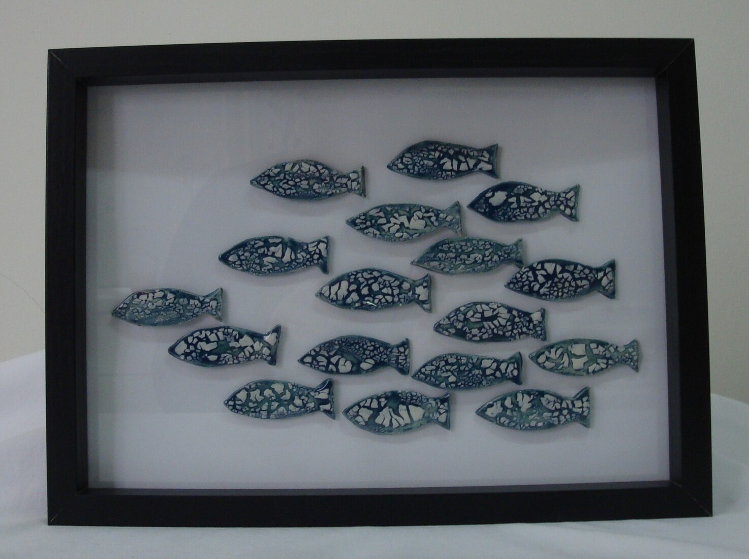 vissen in schilderij