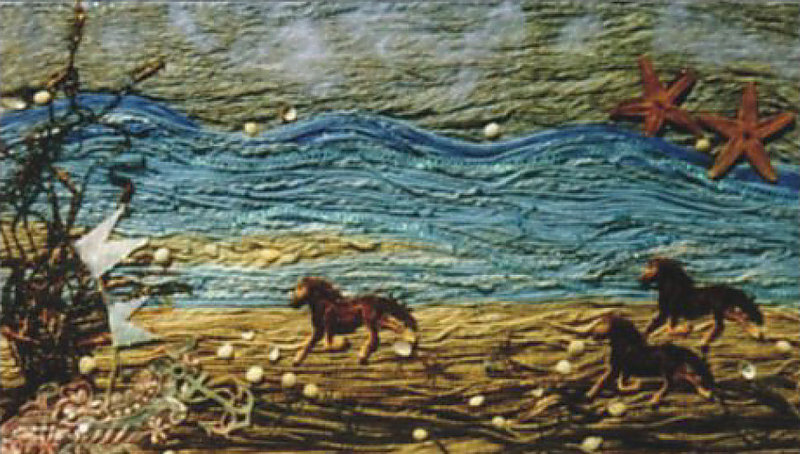 Paarden op het strand