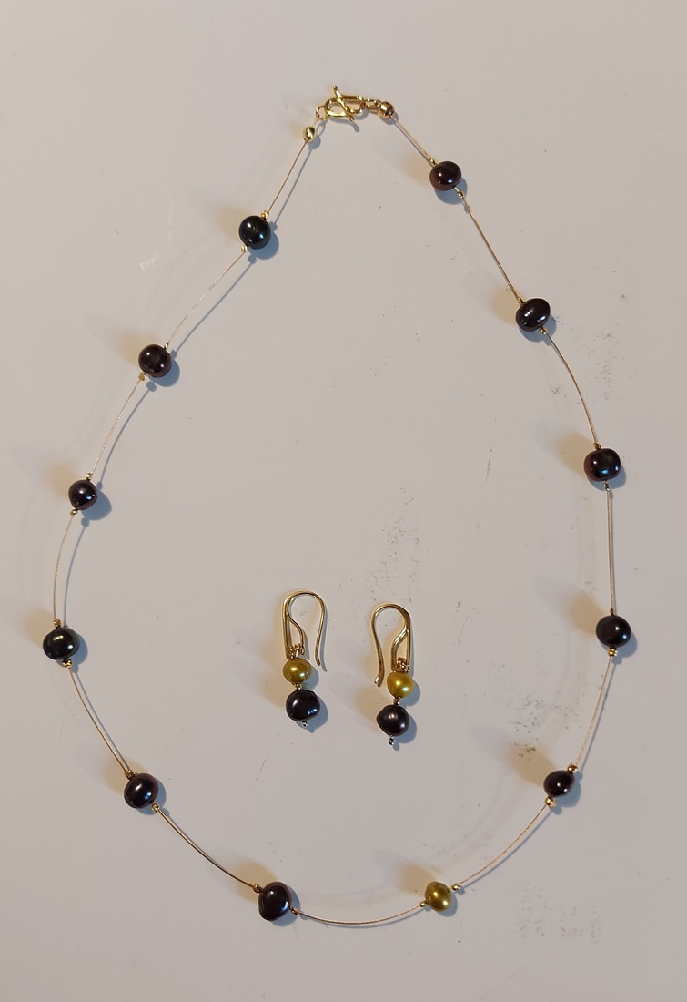 Donkere parels met 1 verrassing