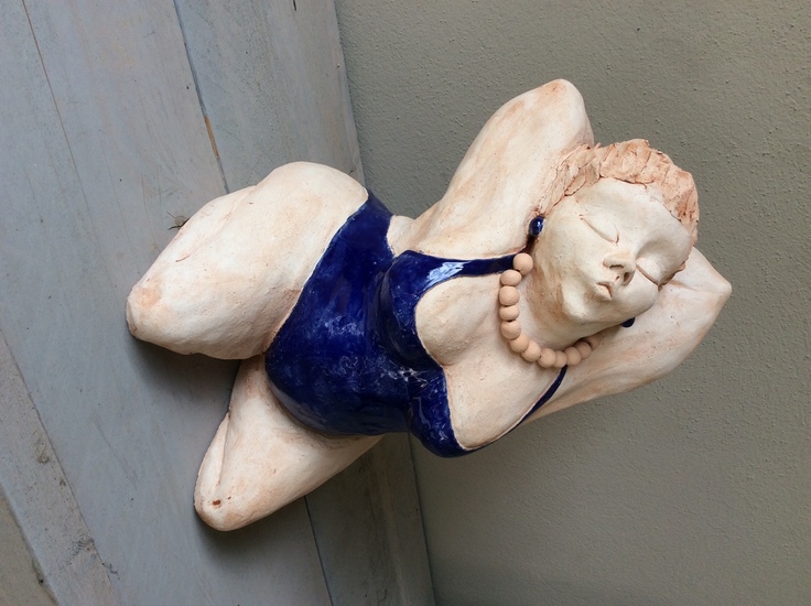 vrouw in blauw badpak