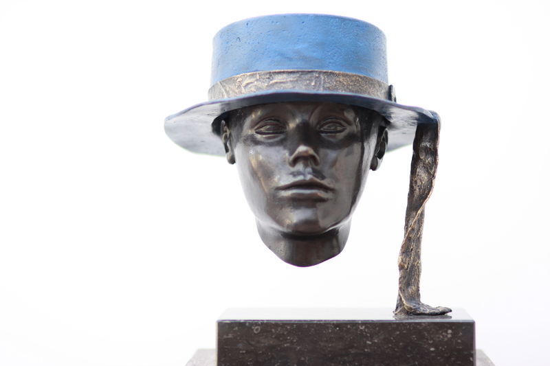 Portret met blauwen hoed