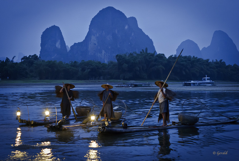 Chinese vissers met aalscholvers