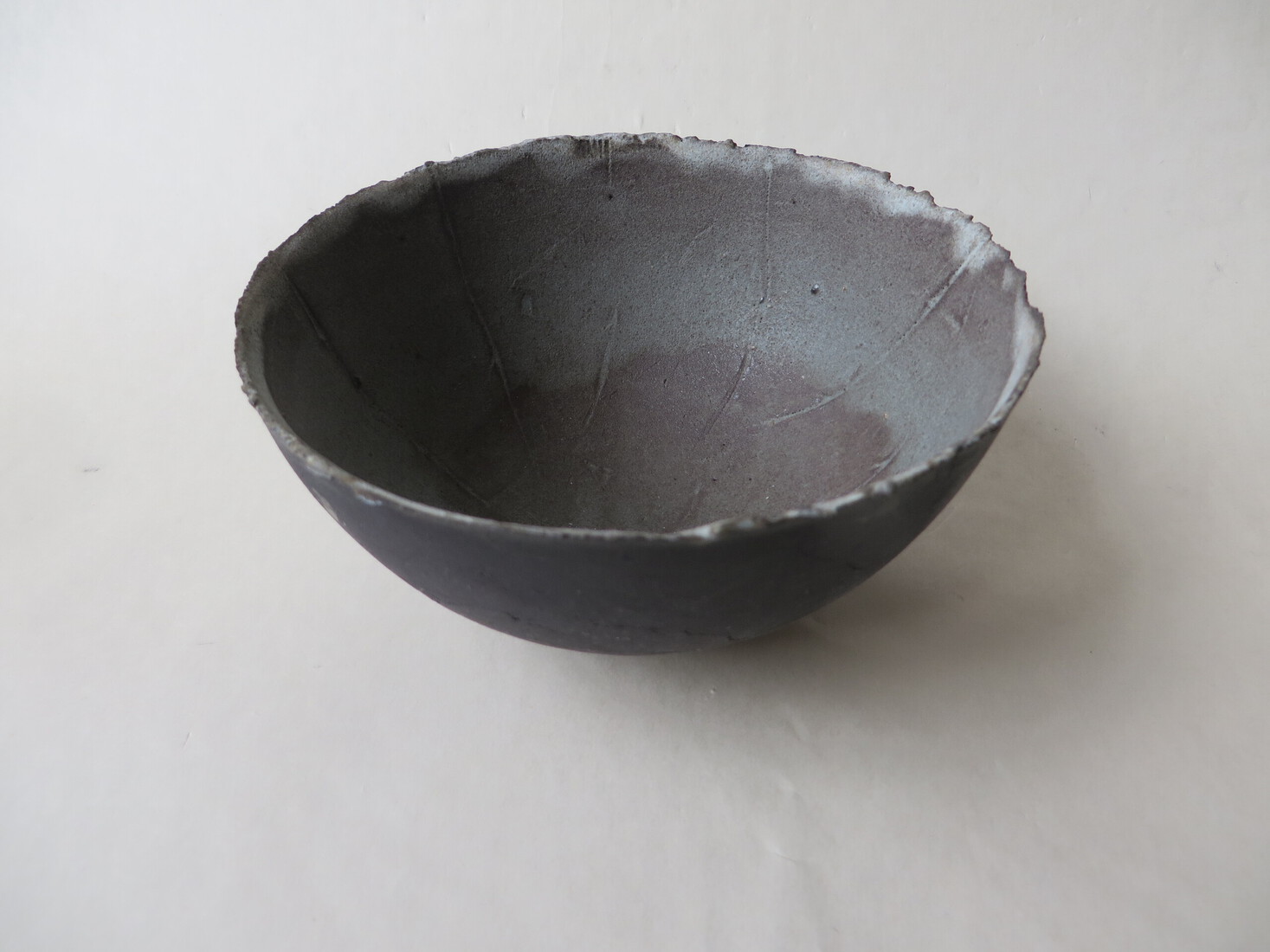 Dark clay bowl II
