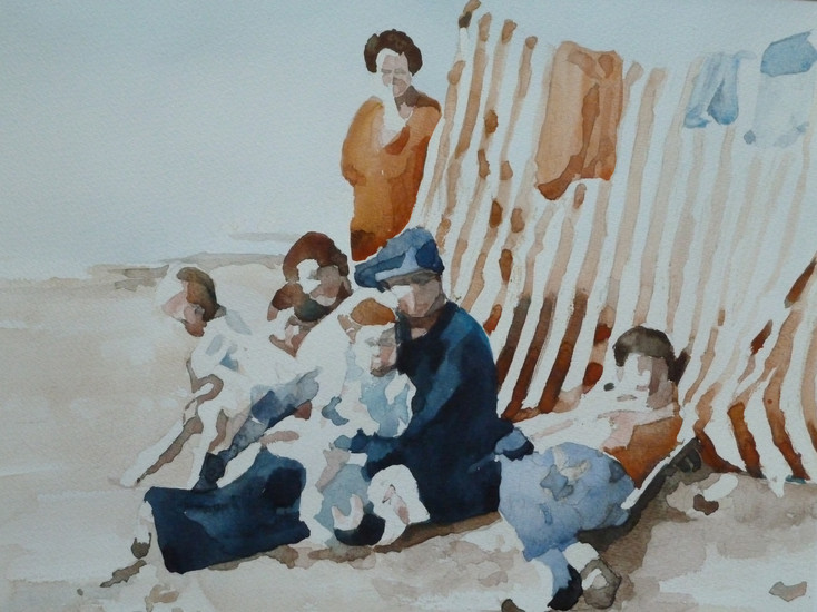 Familie aan het strand