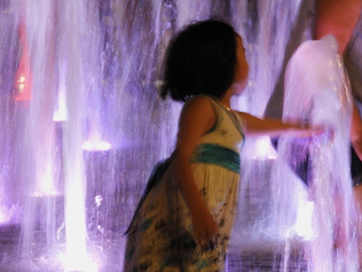 playing in the fountain