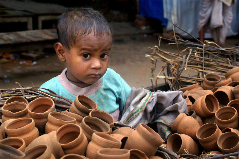 A pottery seller's son