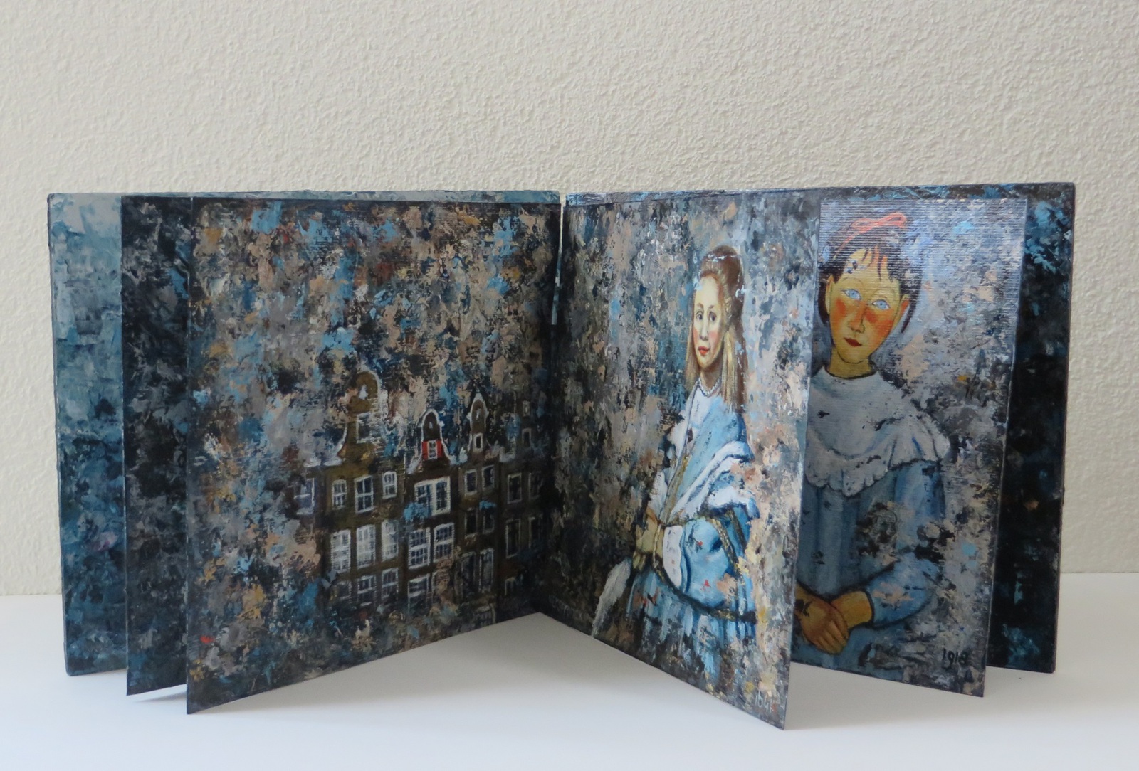 Boekje met kinderportretten