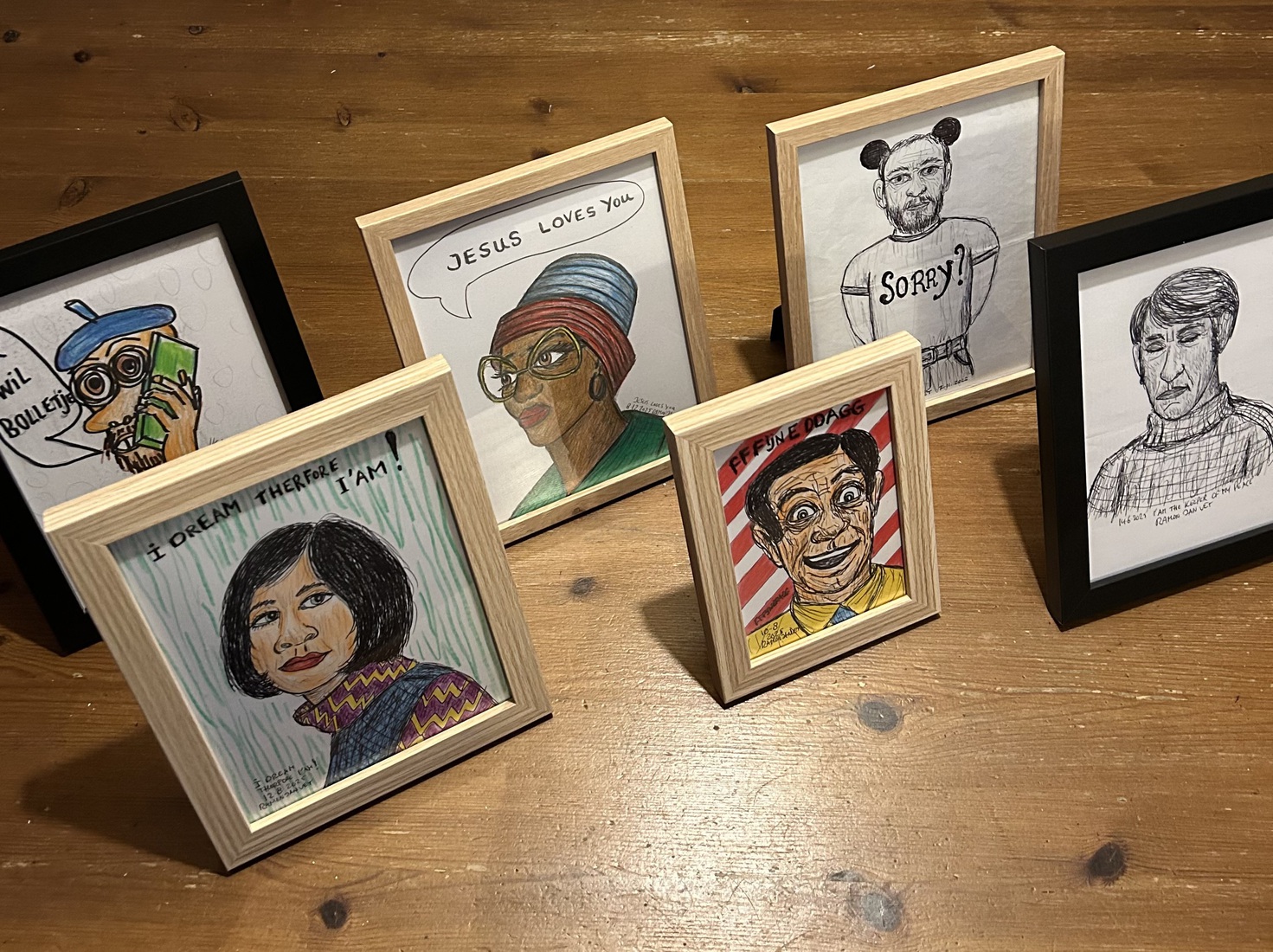 Atelier kleine tekeningen in lijst 15x10