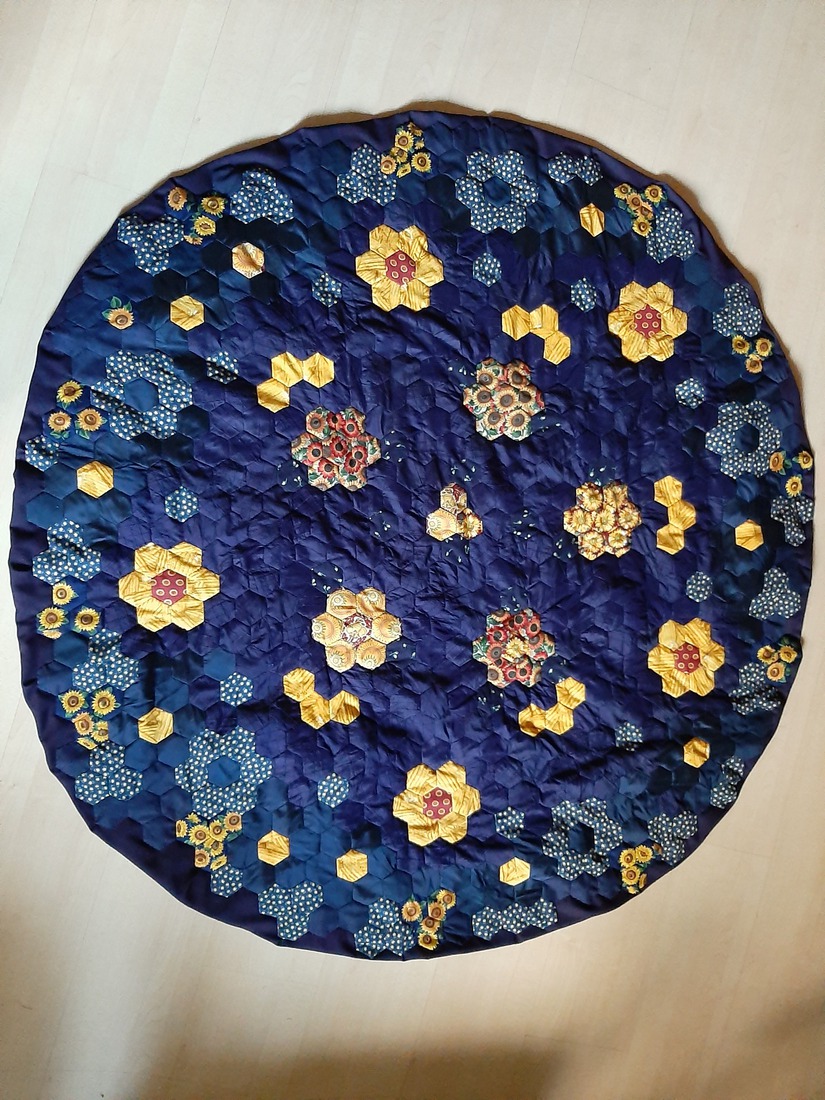 Rond kleedje blauwgeel