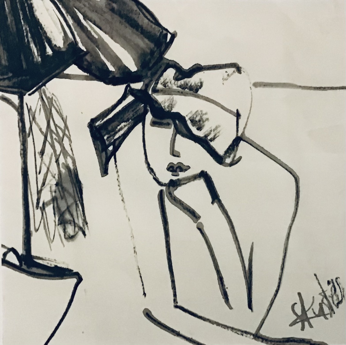 Vrouw met strandhoedje 