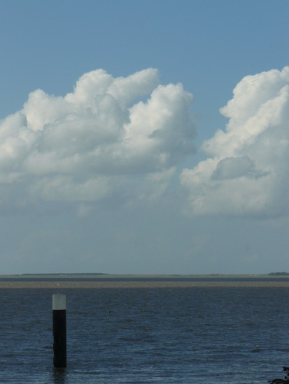 wolken boven de zee 1