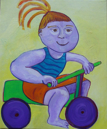 kleuter op driewieler