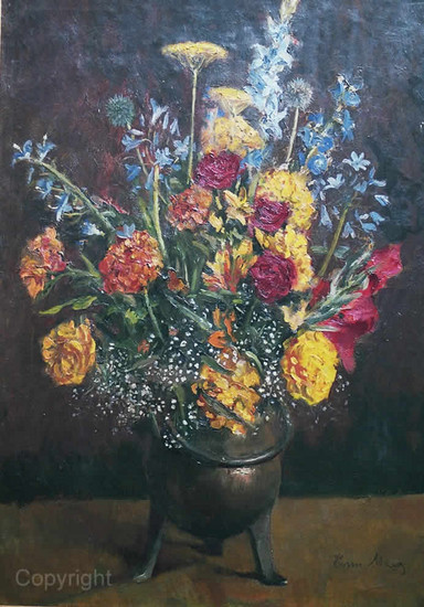 Mixed flowers in copper pot